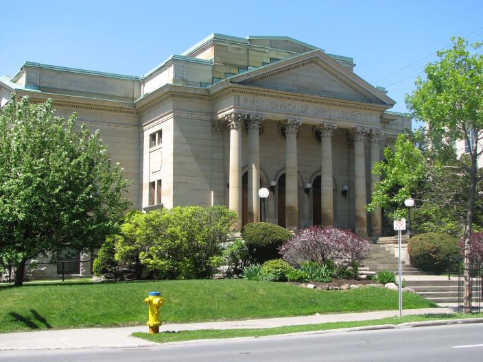 Exterior view of a Classic Italian style church made of sandstone built in 1913.